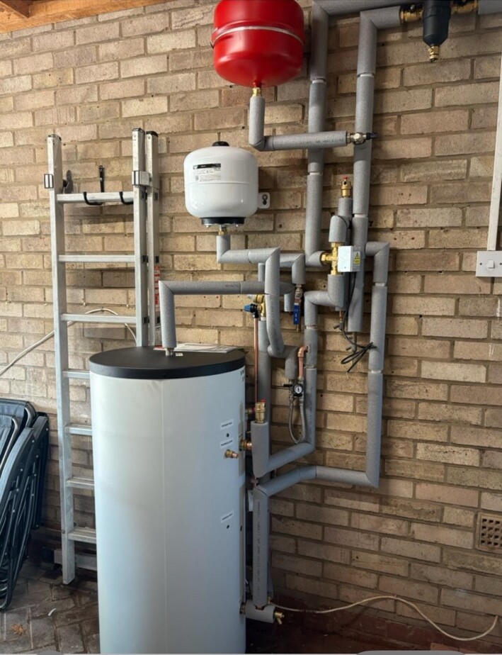 Cylinder and insulated pipework installed by Infinity Heat Pumps